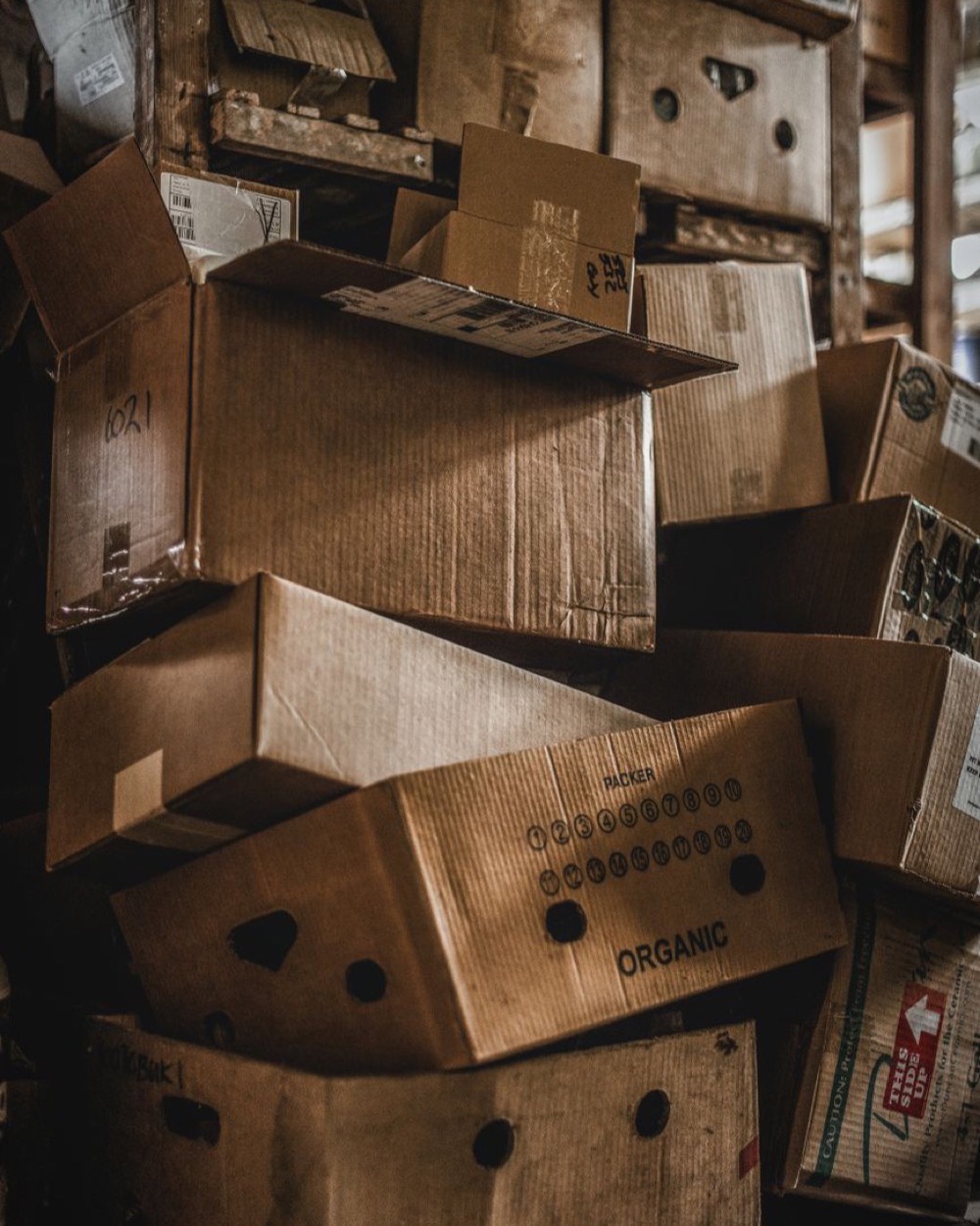 Stacked corrugated fibre cases seen end-on