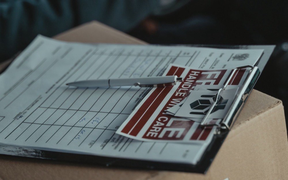 A printed dispatch label on a sealed carton