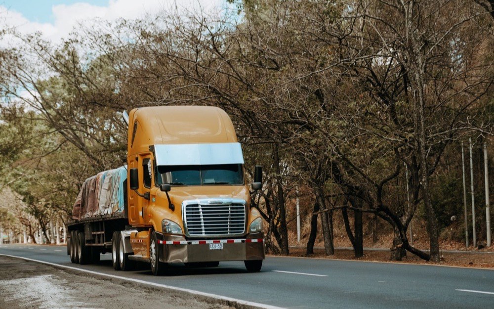 A loaded truck on an open road